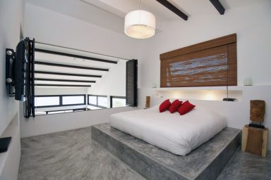 Modern Bedroom concrete Floor with Red Pillow Ideas
