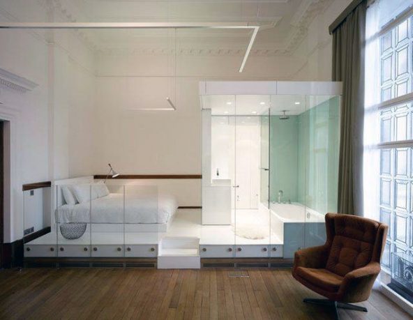 Unique White Bedroom Bed and Bathtub in One Area