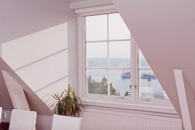 White Sloped Ceiling Window with Lake Malaren Views
