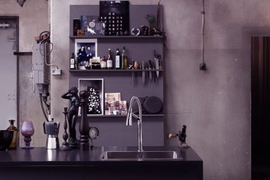 Elegant Dark Kitchen with Stainless Steel Sink Design