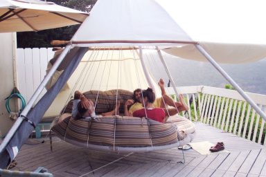 Floating Bed Patio Design with Hammock and Wood Deck