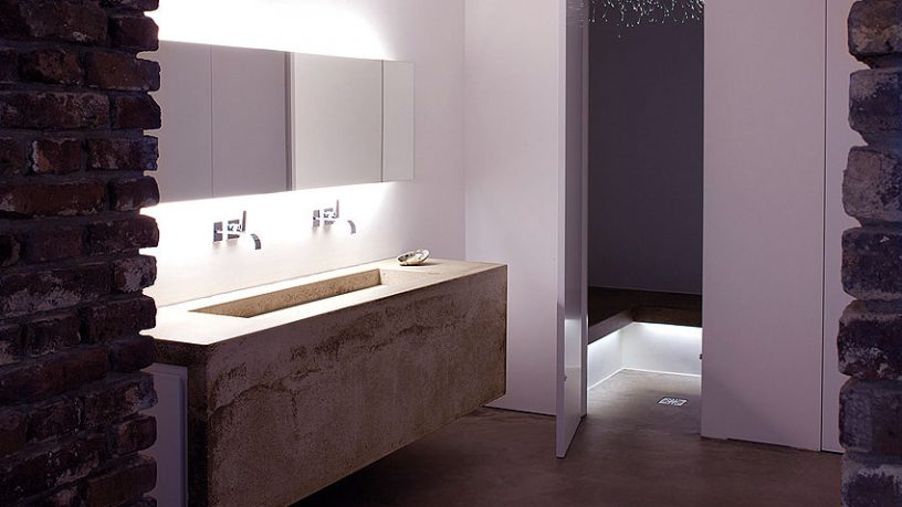 Modern Concrete Basin Design with Large Mirror
