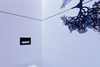 Modern White Square Toilet with Recessed Ceiling Light