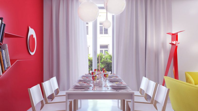 White Dining Room with Red Wall Decor