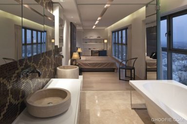 Neutral Bedroom Bathroom in One Area