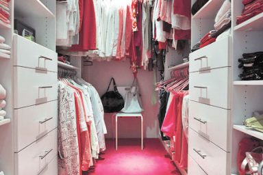 Beautiful Walk-In Closet with Pink Floor