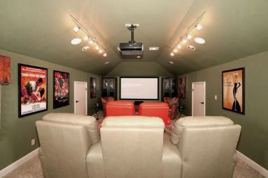 Captivating Movie Room with Green Wall Design