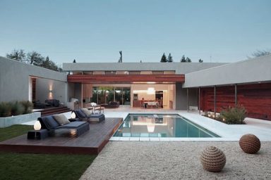 Courtyard Design with Modern Pool and Raised Deck