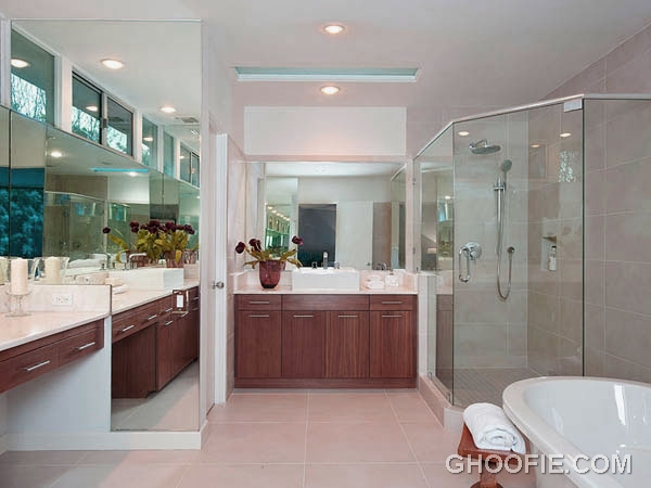 Luxurious Bathroom Design with Wooden Storage and Glass Shower Box