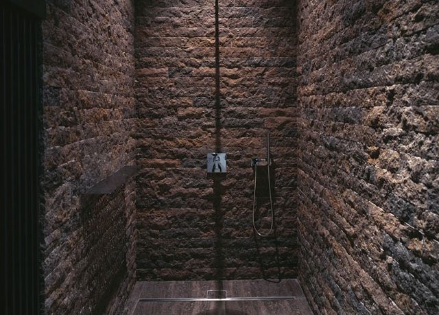 Stacked Stone Wall Bathroom Design