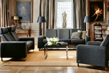 Black sofas with wood floor