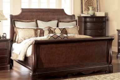 Luxury sleigh bed in master bedroom