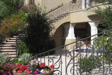 Mediterranean stairway and balcony railing