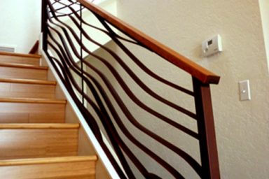 Ocean themed swirling railing banister