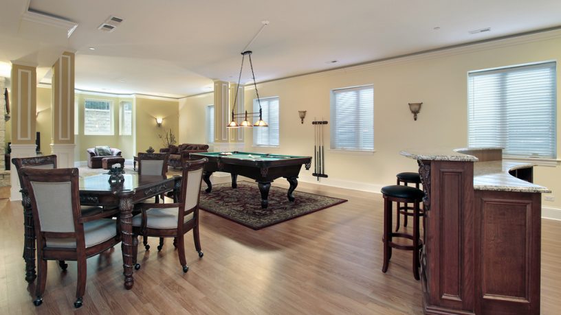 Cool basement with bar and pool table