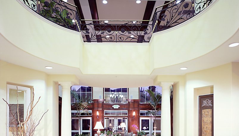 Elegant entry way with marble and chandelier