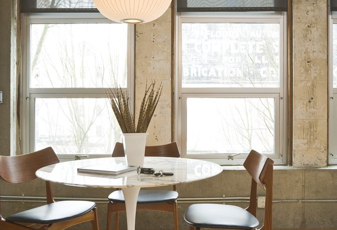 Globe light over wood floor