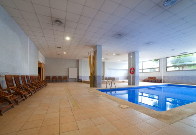 Indoor pool with marble floor