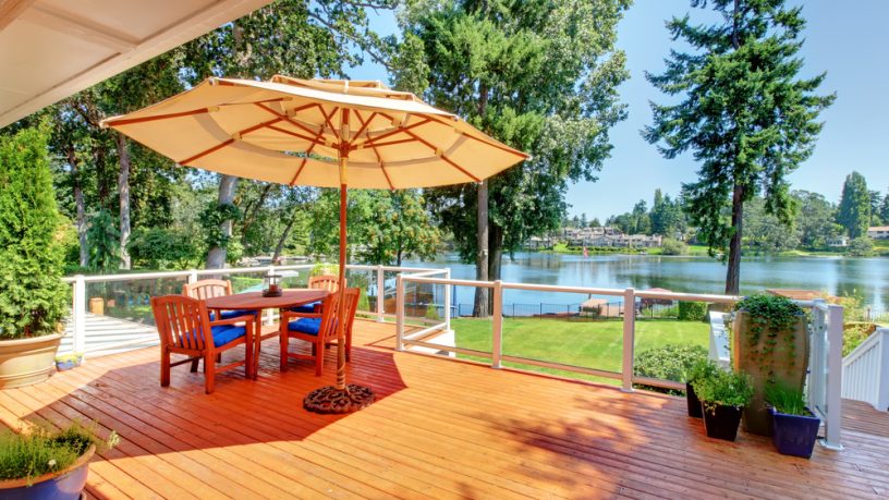 Lake patio design ideas with cabana