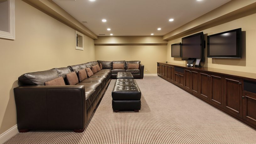 Nodern basement with 3 TVs