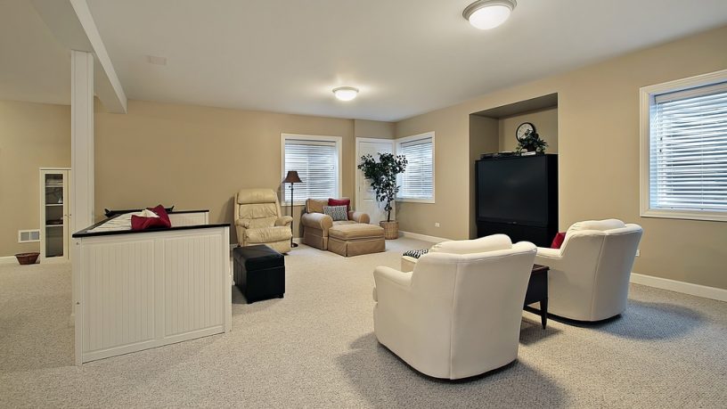Modern basement with beige accents