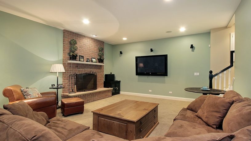 Modern basement with fireplace and lounge