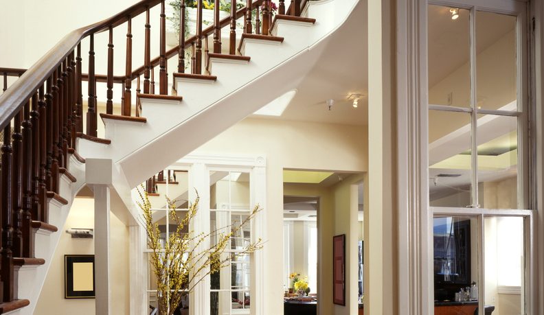 Simple entry way will elegant railing