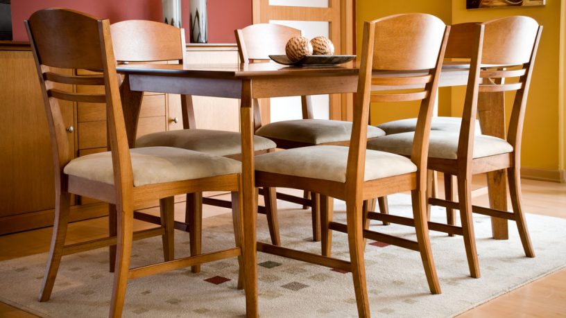Traditional dining room with six wood chairs